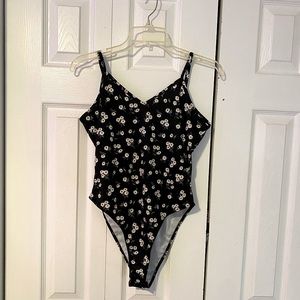Black bodysuit with flowers, size medium, never worn